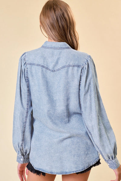 back of denim shirt on model