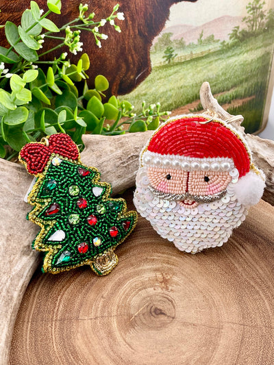 two christmas keychains on display