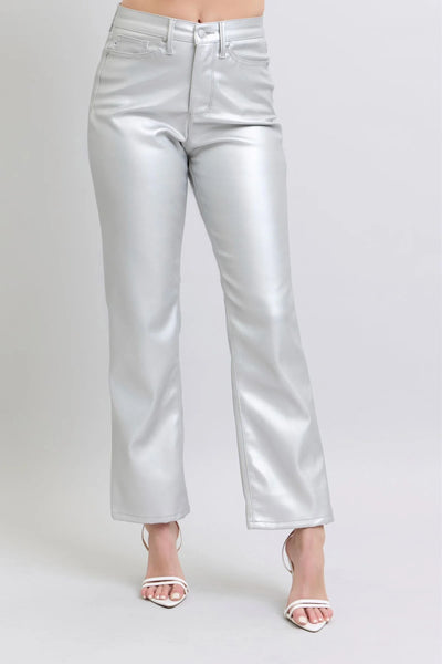Silver metallic pants on a plain background
