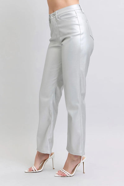 Silver pants worn by a person on a white background