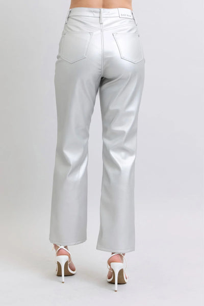 Silver metallic pants on a white background