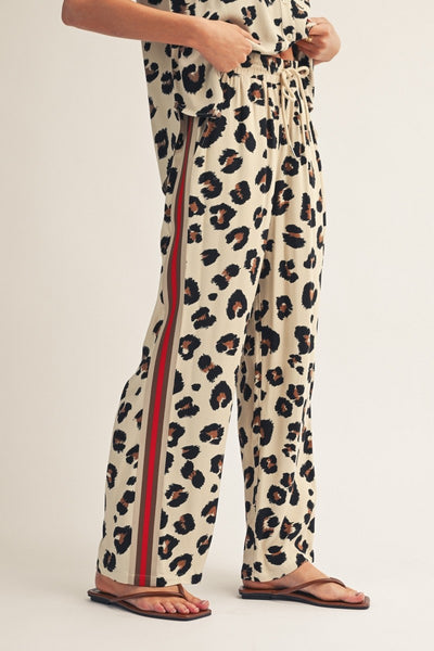 model wearing leopard drawstring pants