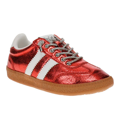 A metallic red low-top sneaker with three white stripes, silver glittery laces, and a brown gum sole, shown on a plain white background.
