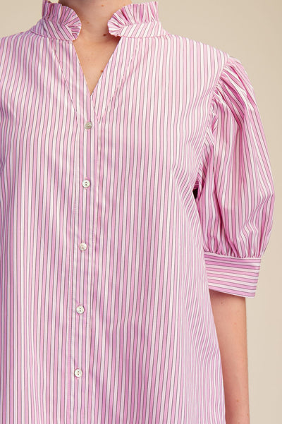 Pink and white striped shirt with puffed sleeves on a beige background