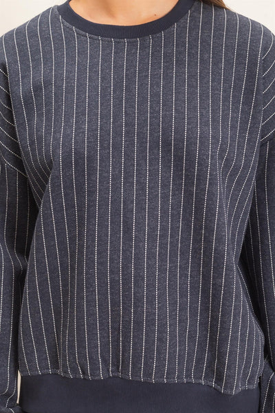 close up of navy striped sweatshirt