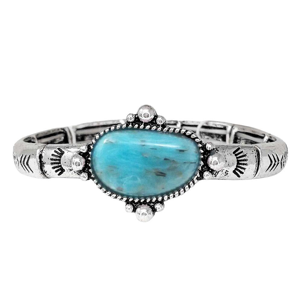 turquoise stretch bracelet with a white background