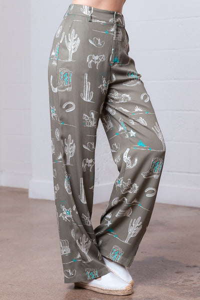 Patterned pants with cactus design on a plain background