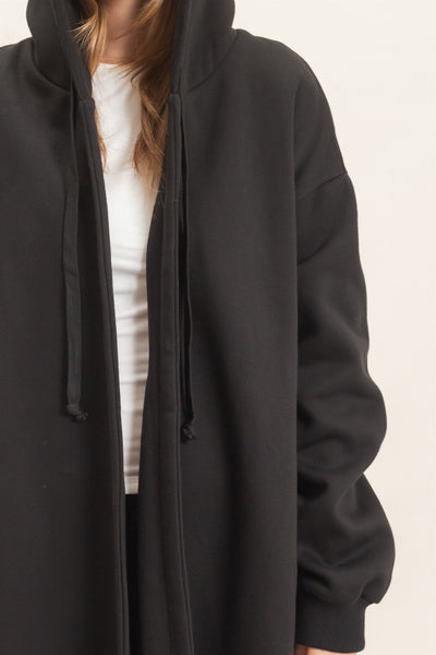 close up of hooded black coat