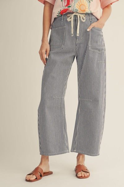model wearing denim striped pants