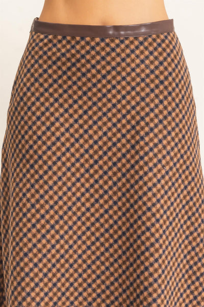 close up of dark brown checkered skirt
