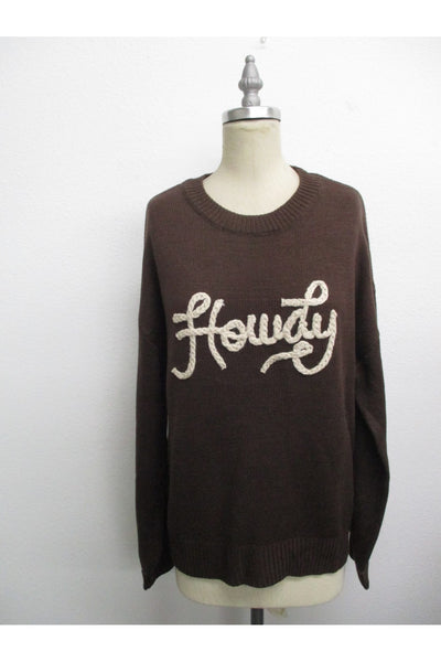 brown sweatshirt pullover with white braided rope spelling HOWDY across the chest
