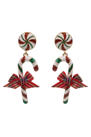 Green & red candy cane earrings on a white background