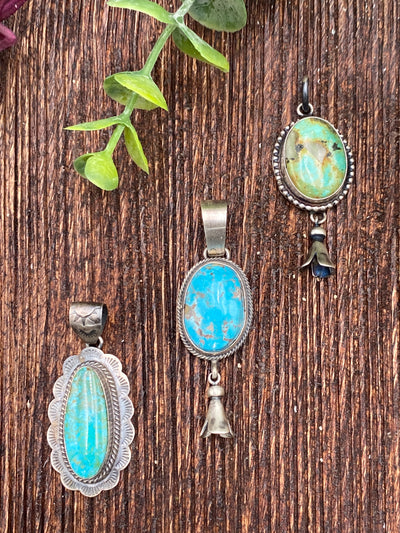 Canyon Roped Oval Turquoise Sterling Flute Pendant