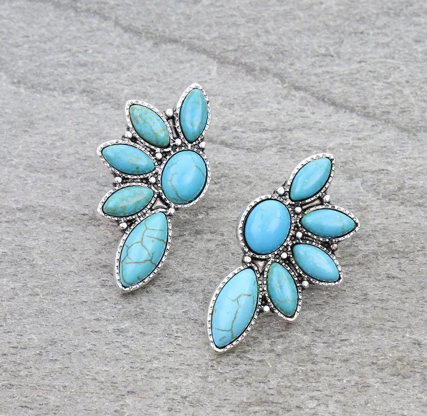 Turquoise earrings on a gray background