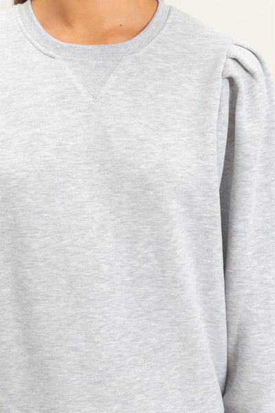 close up of gray puff shoulder sweatshirt