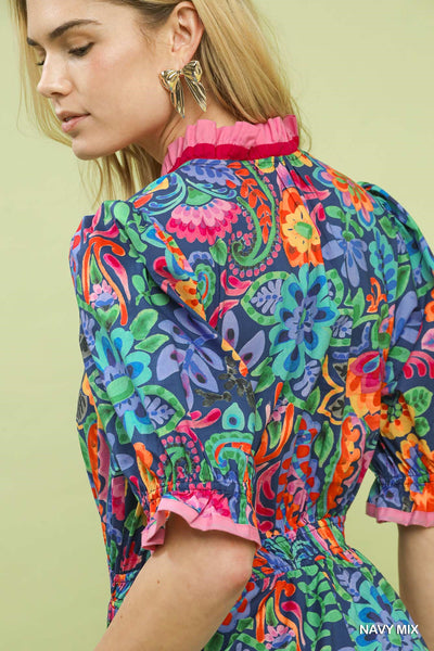 model wearing a navy floral dress