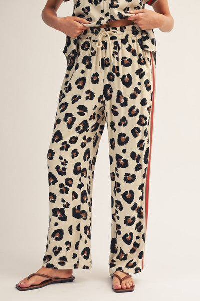 model wearing leopard drawstring pants