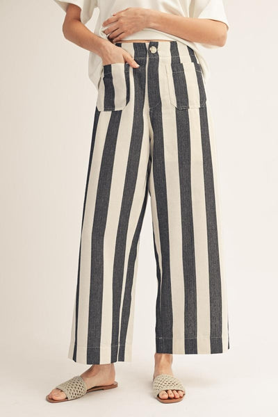 model wearing black stripe pants