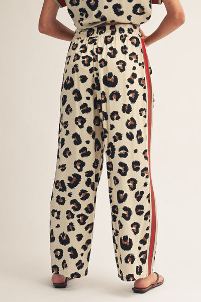 model wearing leopard drawstring pants