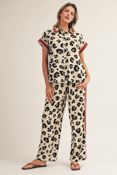 model wearing leopard drawstring pants & matching top