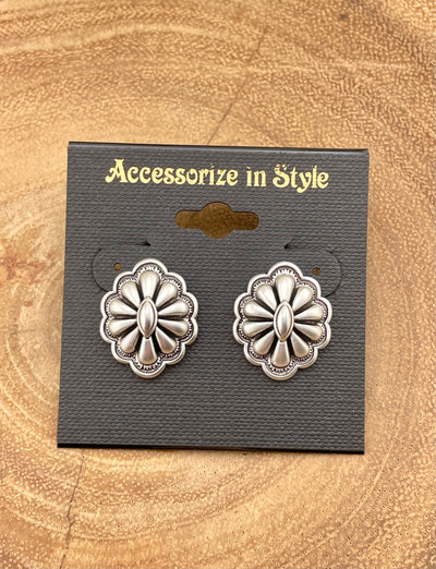 Oval center concho earrings on a 'Accessorize in Style' card with a wooden background