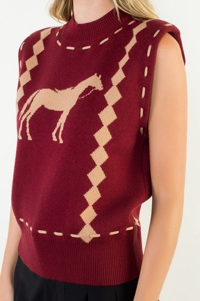 Red sleeveless sweater with horse design on a white background