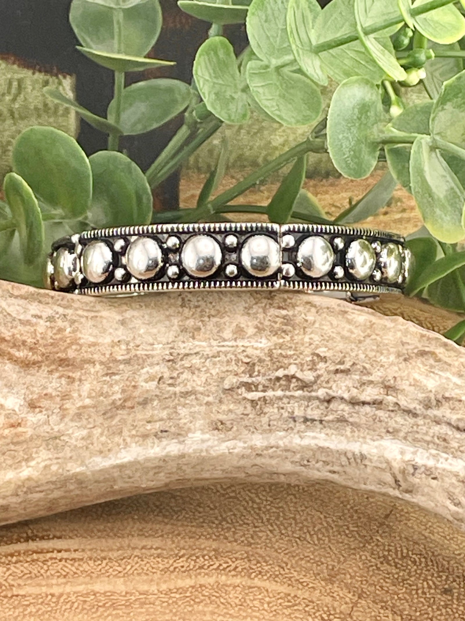 silver bracelet on display