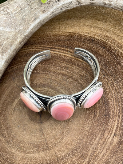 Waves of Grain Sterling 3 Stone Pink Conch Cuff - Vertical Center