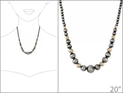 Two tone bead necklace on white background