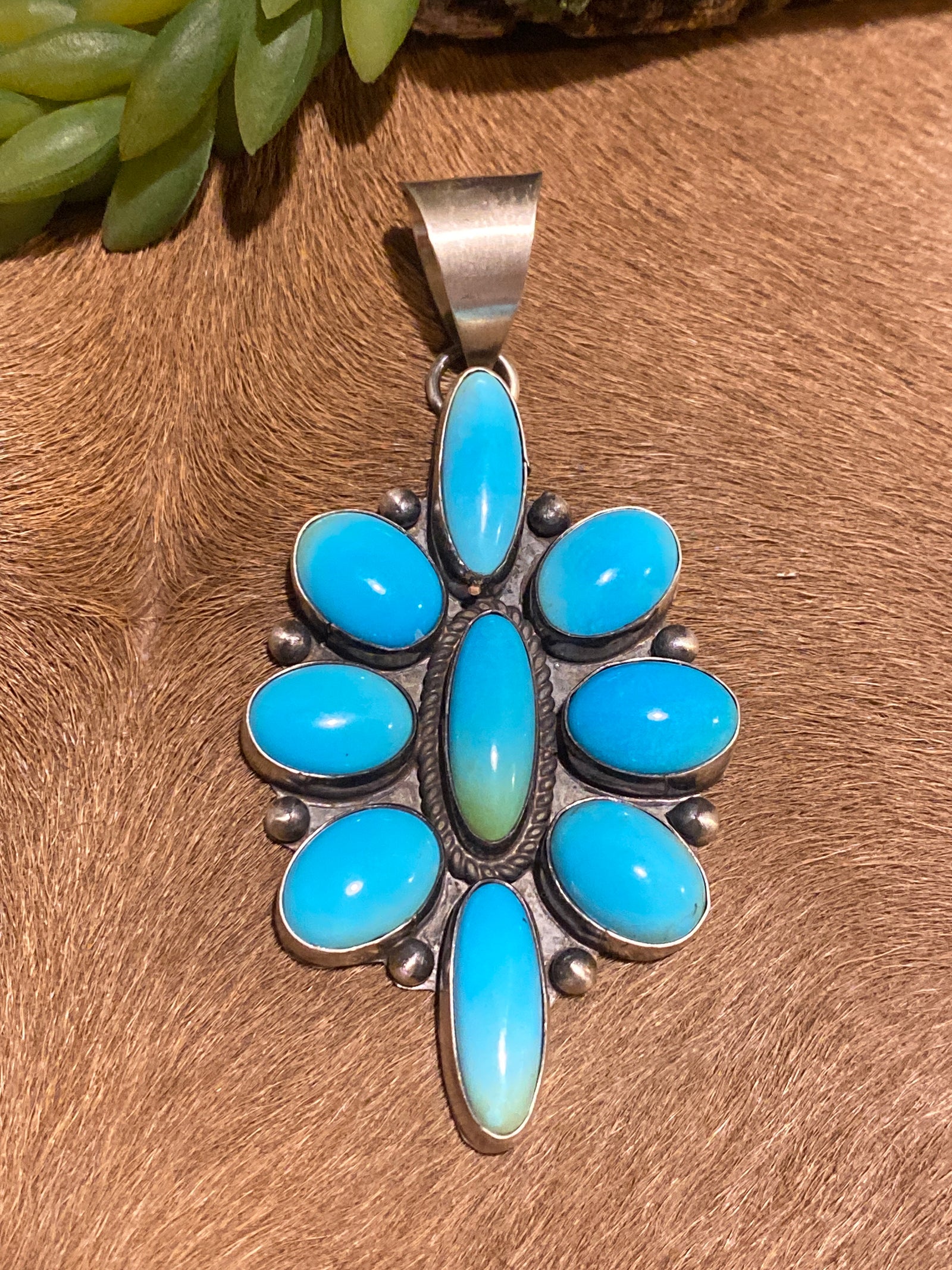Kimbell 9 Stone Sleeping Beauty Turquoise Sterling Pendant