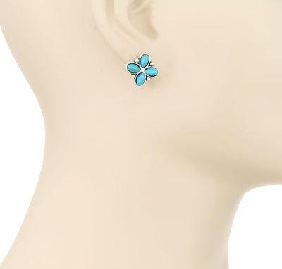 turquoise flower earring on mannequin ear