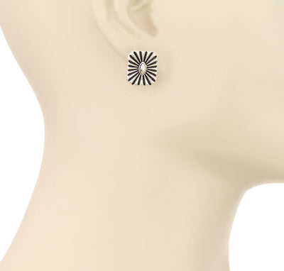 fashion Concho earrings on a mannequin