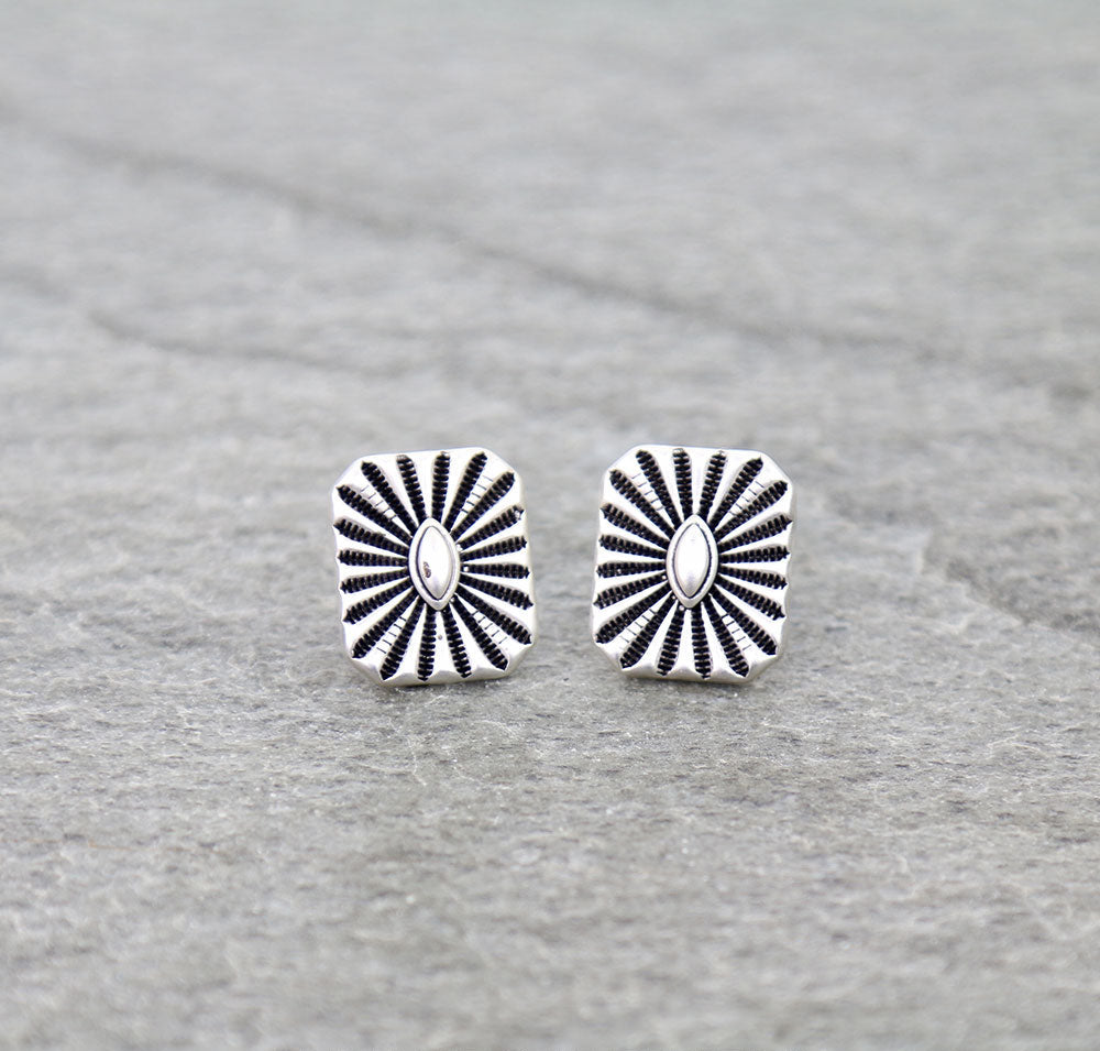 fashion Concho earrings on a gray background