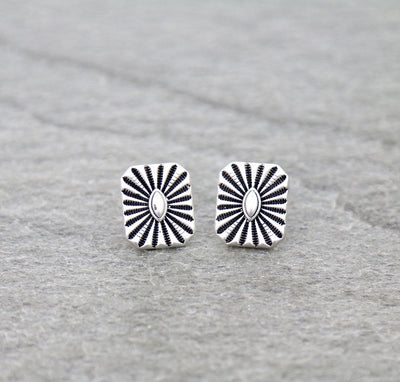 fashion Concho earrings on a gray background