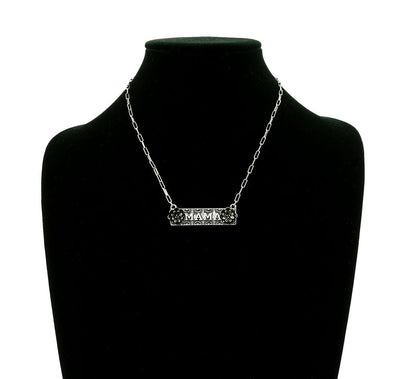 Necklace with 'MAMA' pendant on a black mannequin bust.