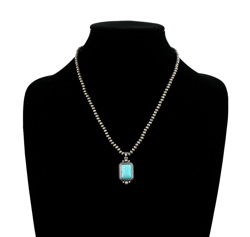 silver bead necklace with turquoise pendant