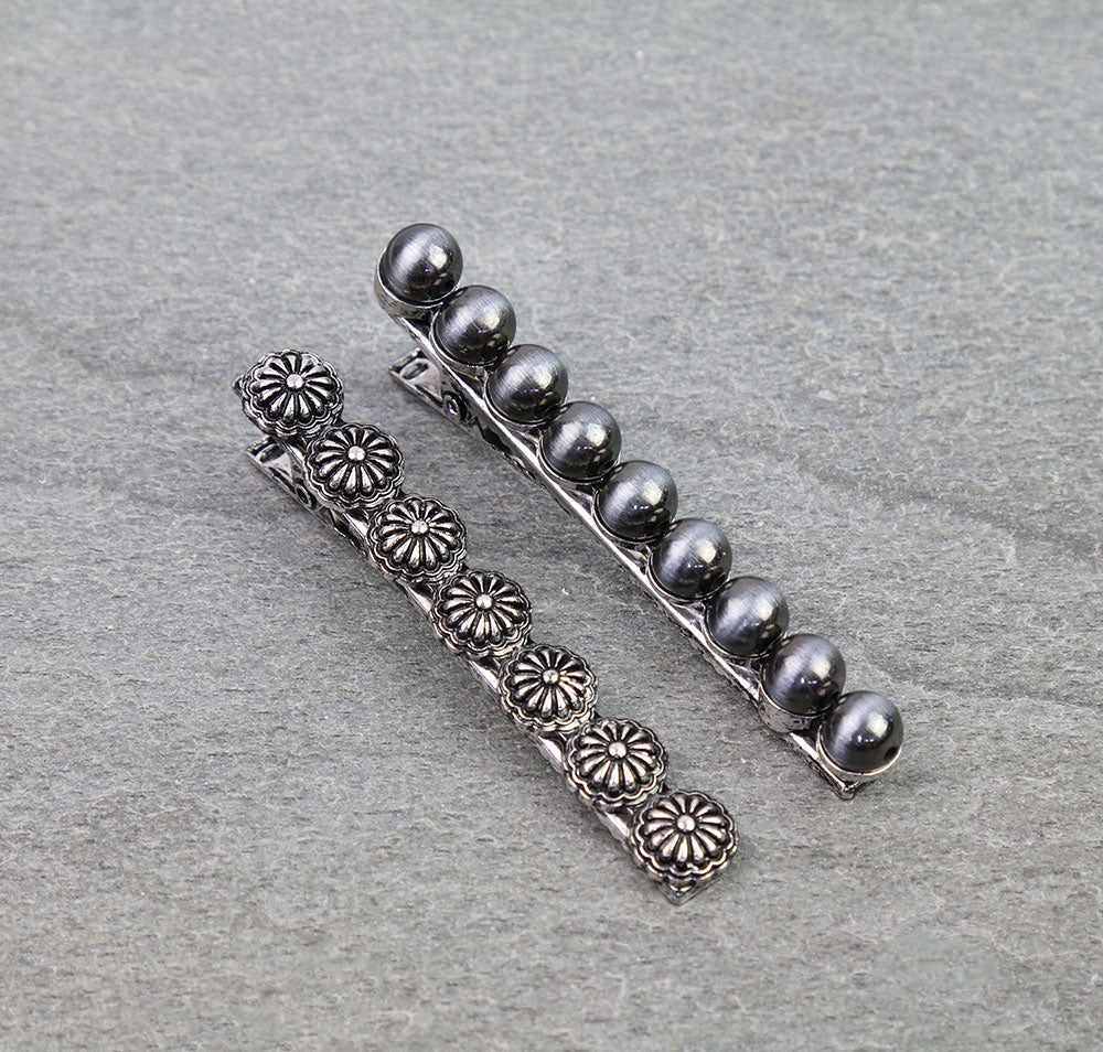 set of 2 fashion silver hair pins on a gray background