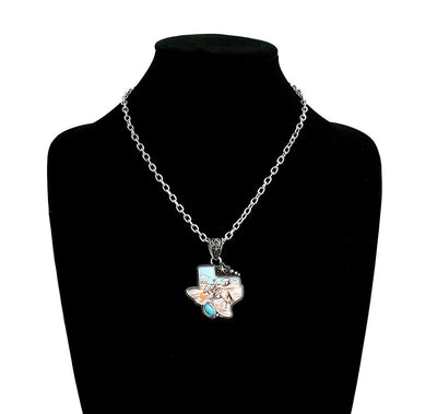 Necklace with a Texas-shaped pendant on a black mannequin bust.