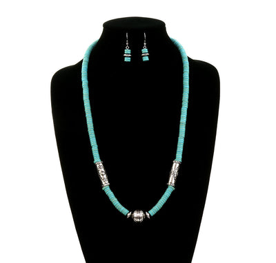 silver & turquoise saucer necklace & earrings on a black jewelry bust