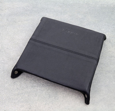 back of black leather tray