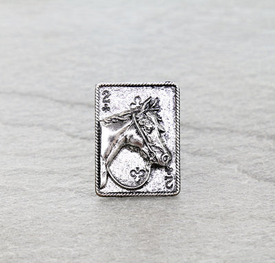 playing card ring with a horse on a gray background