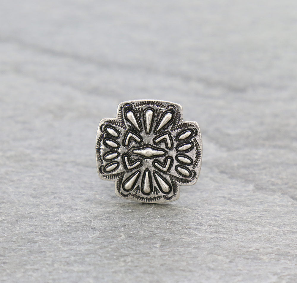 silver cross cuff ring on a gray background