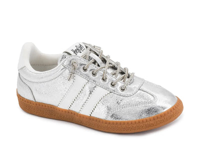 Silver sneaker with brown sole on a white background