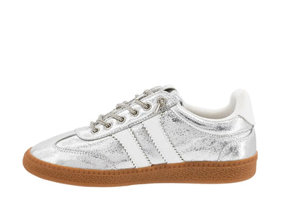 Silver glitter sneaker with brown sole on a white background