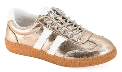 Gold metallic sneaker with white stripes on a white background