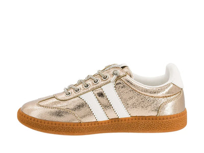 Gold metallic sneaker with white stripes on a white background