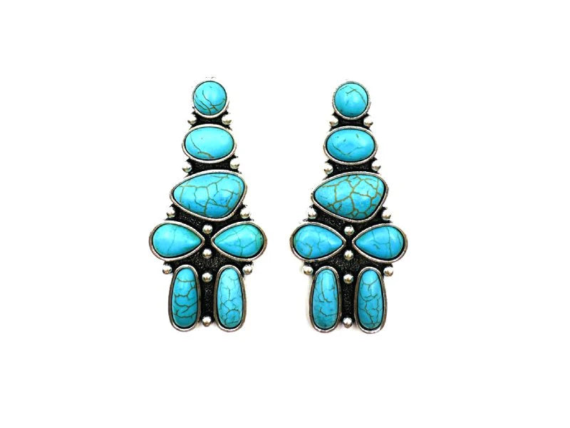 pair of turquoise earrings on white background