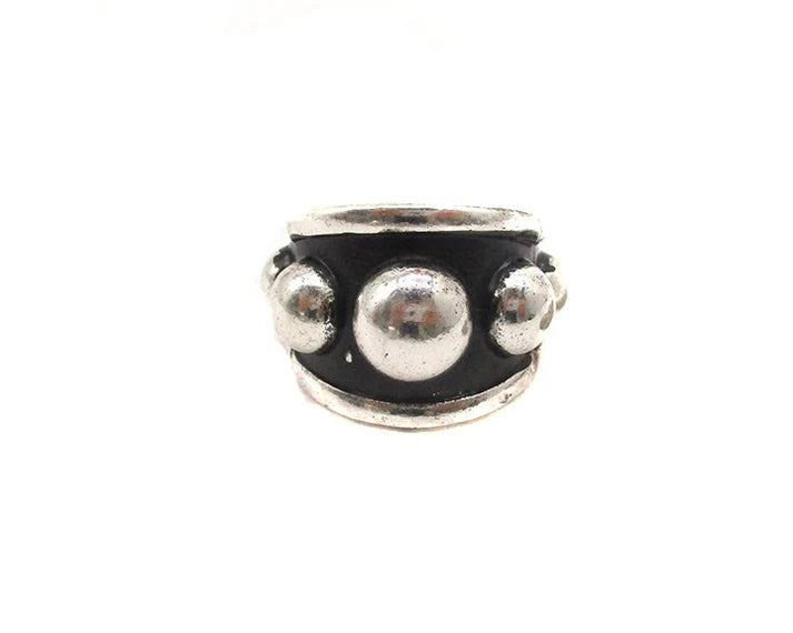 silver stretch Studded ring on a white background