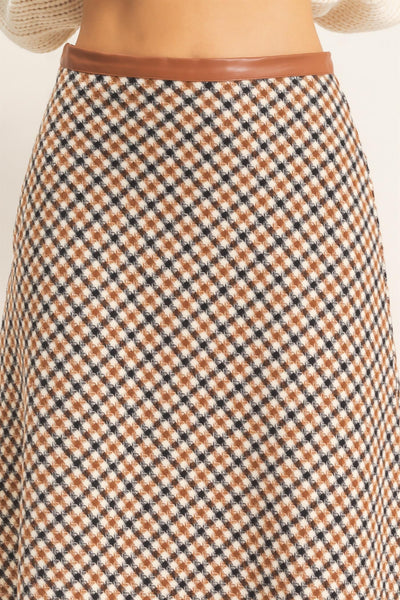 close up of camel checkered skirt
