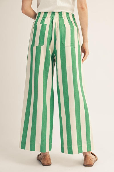 model wearing green stripe pants